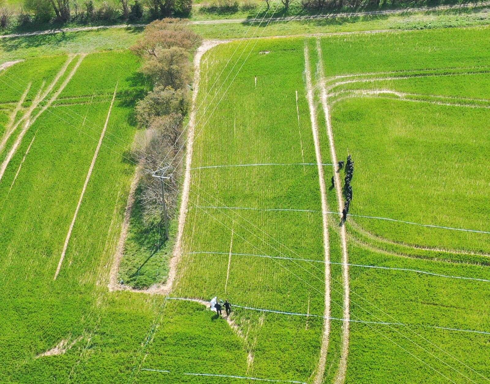 Police searching fields Pictrure: UKNIP (46720971)