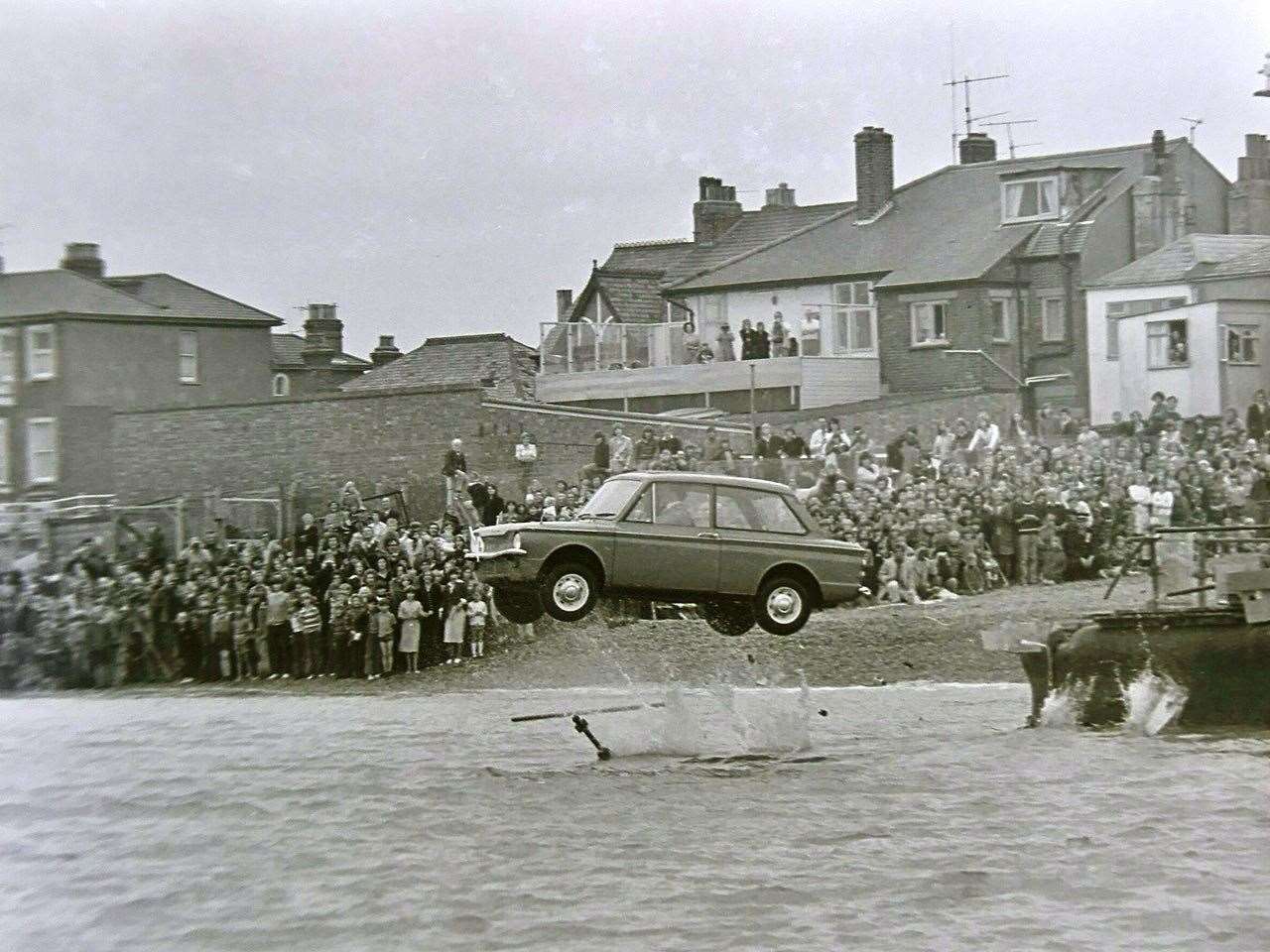 Gone! The Hillman Imp launched into the sea with Michael Crawford inside filming the 1975 Christmas special of Some Mothers Do 'Ave 'Em off Sheerness. Picture: Barry Hollis