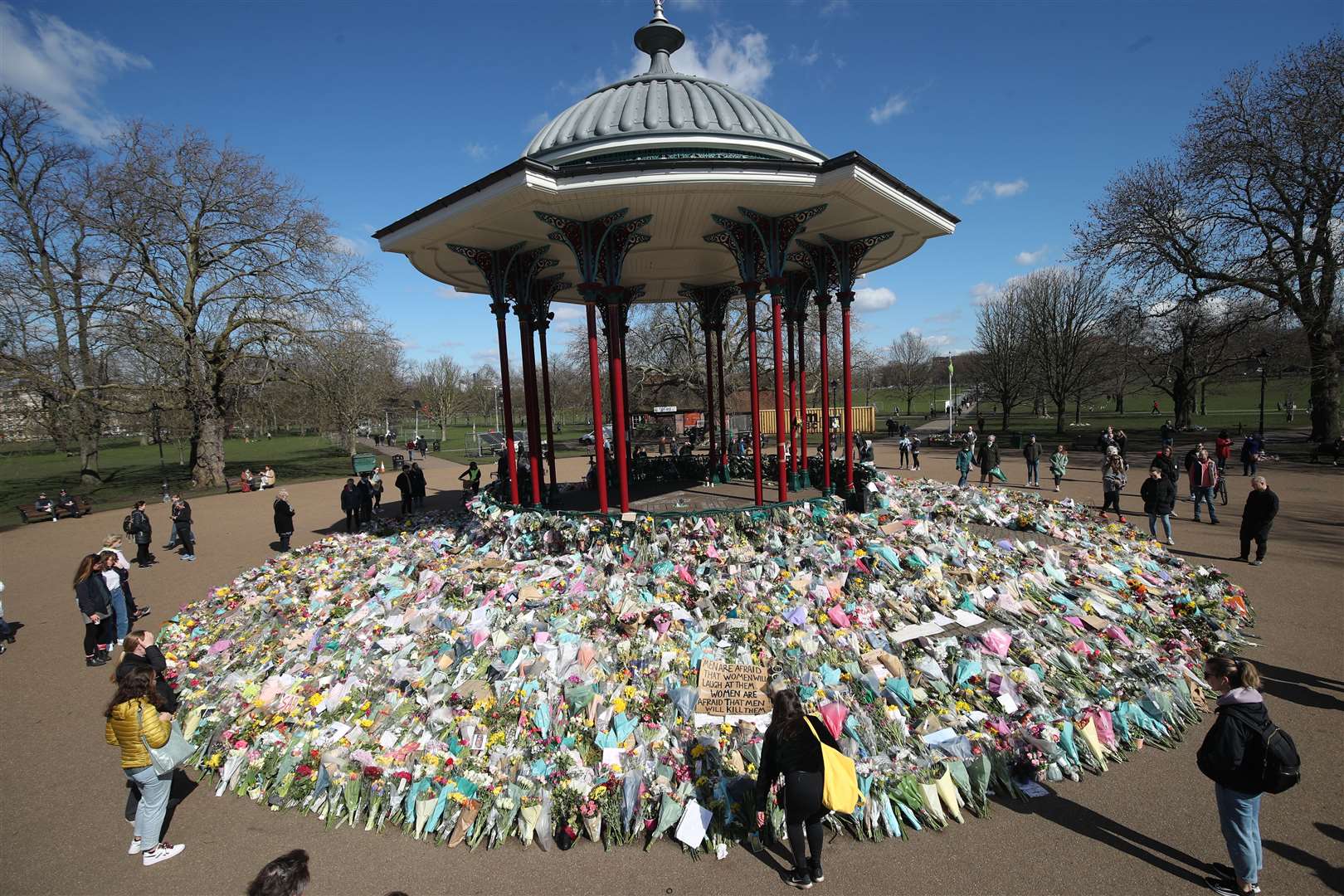 Floral tributes for Sarah Everard near the bandstand on Clapham Common (Yui Mok/PA)