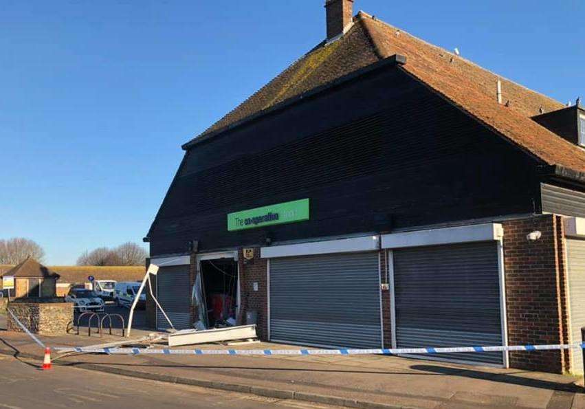 The shop was cordoned off by police. Picture: Owen Forrest. (7392644)