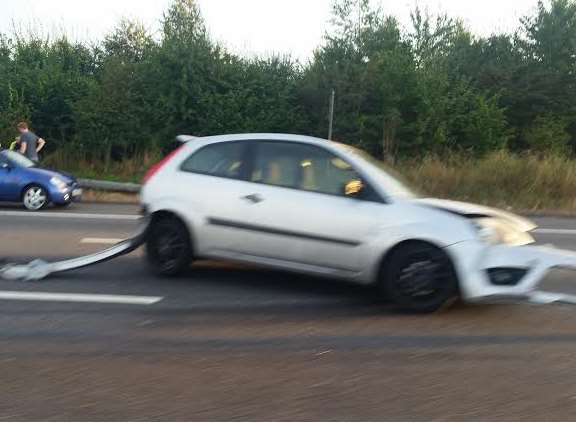 A damaged car on the A2