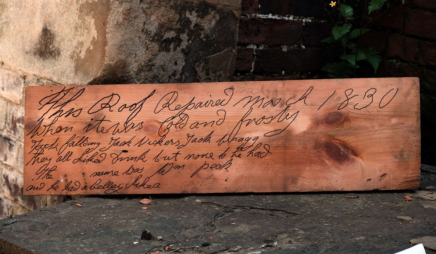 An uncovered roof board with an inscription etched into it from 1830 (Steve Mettam/Wentworth Woodhouse Preservation Trust)