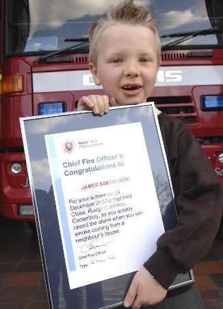 James Samuelson is presented with his award. Picture: CHRIS DAVEY