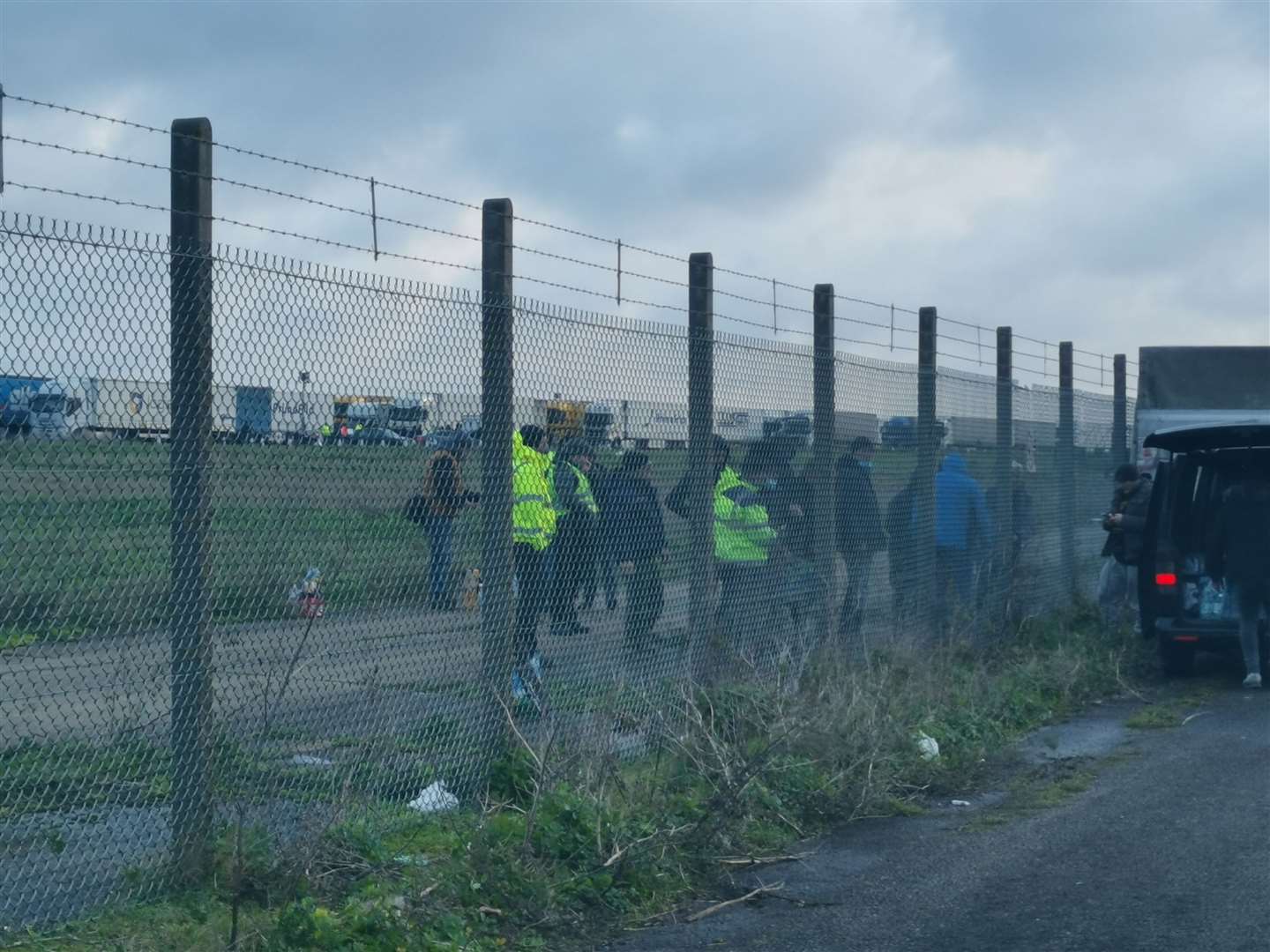 Food is passed to lorry drivers stranded at Manston Airport