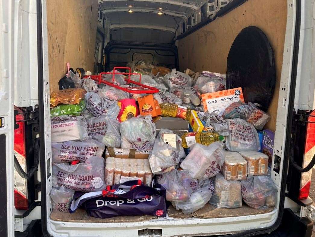 Inside one of the vans heading out to deliver to food banks in Kentkmfm’s Tonnes of Tins campaign 2024