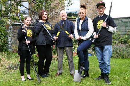 Abby Dewberry, Alison Neate, Chloe Ballard and Charlie Starling do the gardening for war veteran Greg Willott