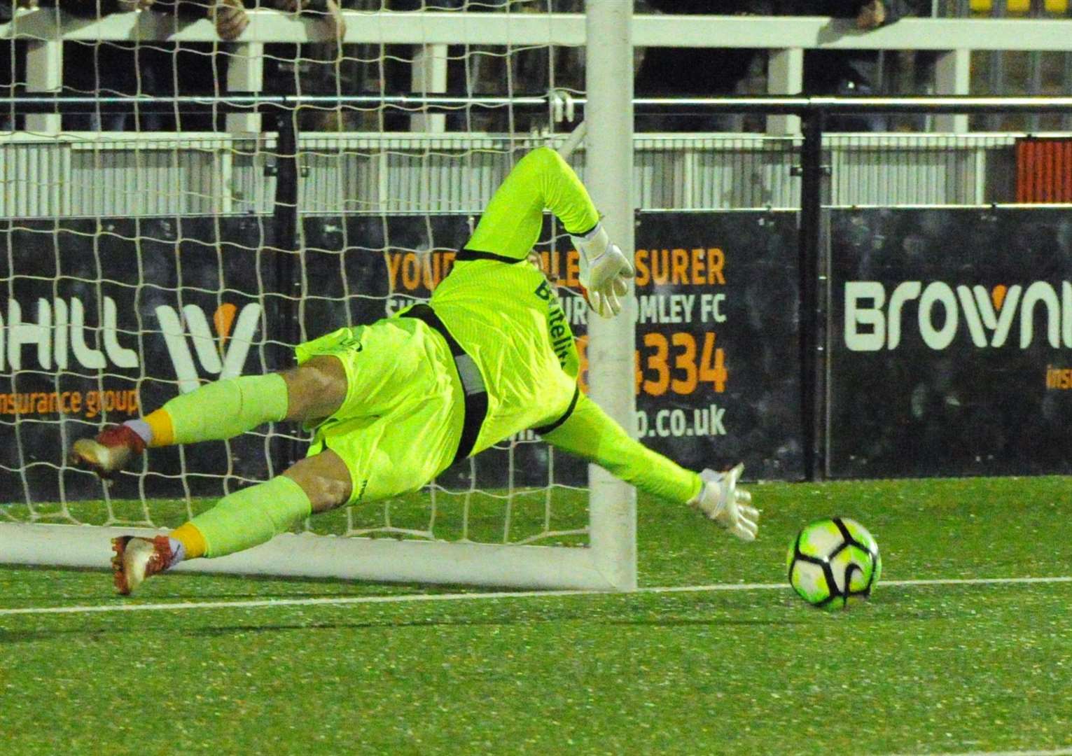 Chris Lewington saves from the spot in Maidstone's Kent Senior Cup final win Picture: Steve Terrell