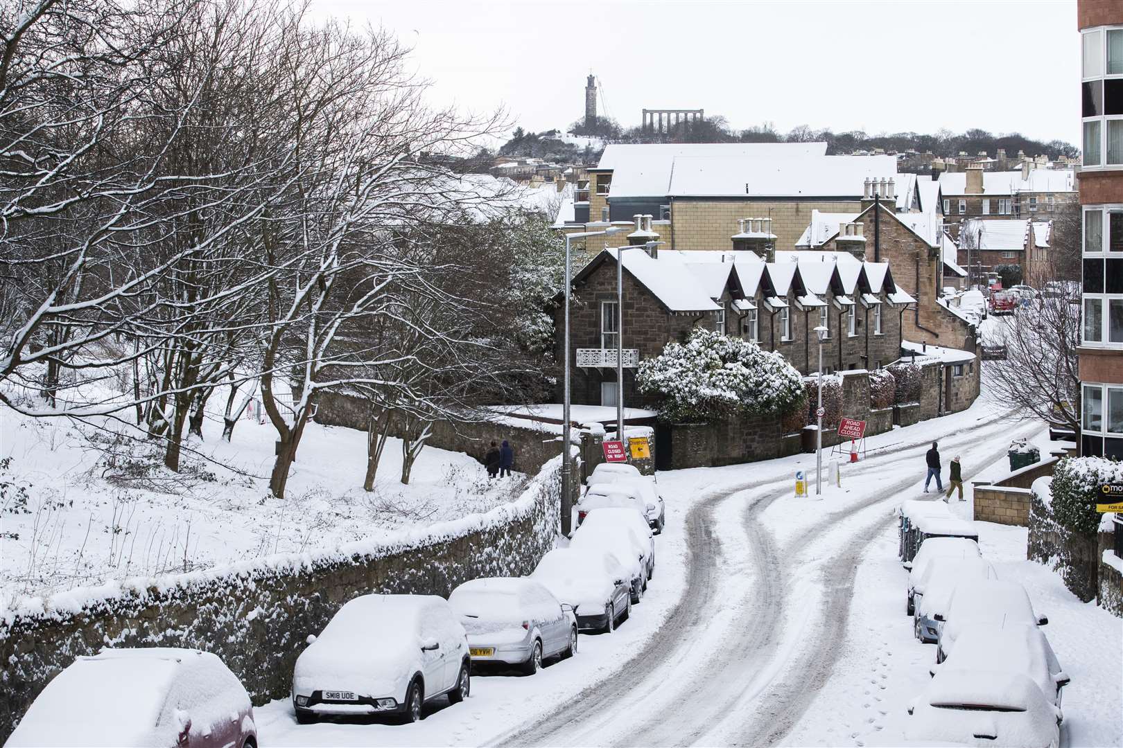 Snow covers the streets in Holyrood, Edinburgh (Jane Barlow/PA)