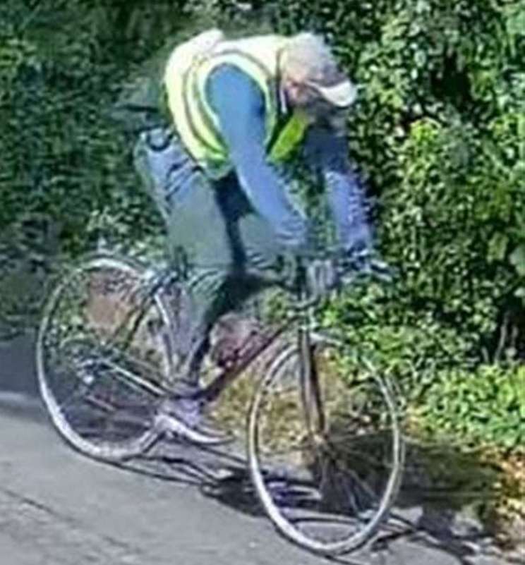 This cyclist spotted in a high-vis jacket in Staplehurst is wanted in connection with a violent burglary. Picture: Kent Police