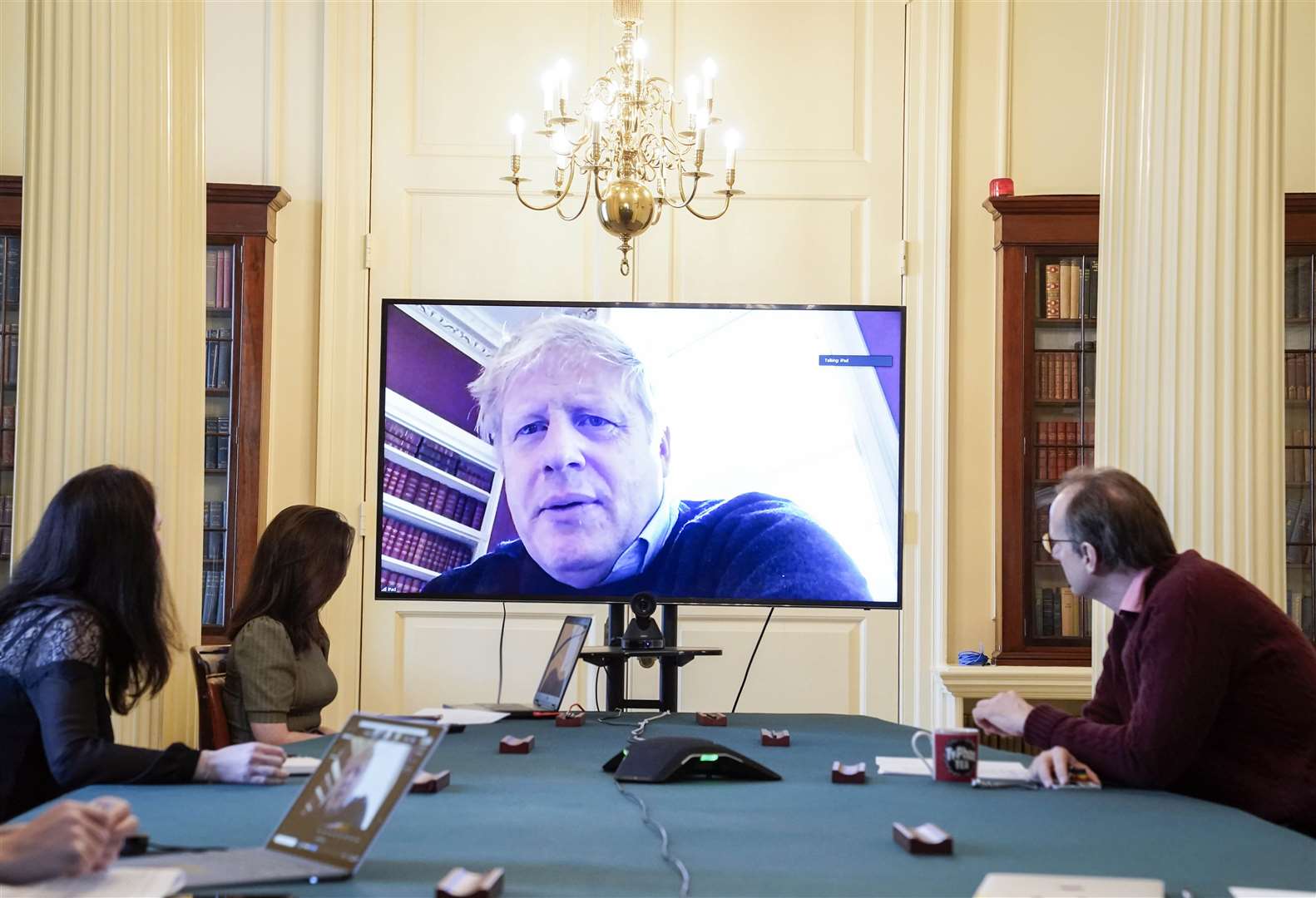 Mr Johnson chairing the morning Covid-19 meeting in 10 Downing Street from a video link to his flat above No 11, after self-isolating with coronavirus symptoms but before his health took a dramatic turn for the worse (Andrew Parsons/Crowm Copyright/PA)