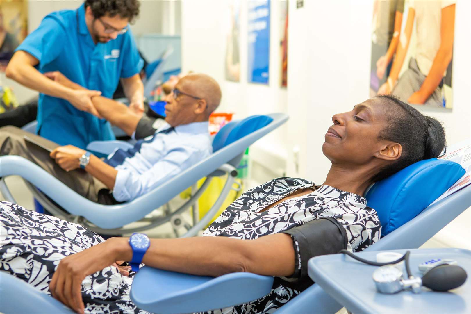 Lord Simon Woolley, left, and Dame Sharon White giving blood as part of efforts to raise awareness of the shortage of black donors (Rich Barr/PA)