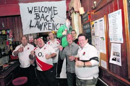 The pub's regulars toast the cut-out's return