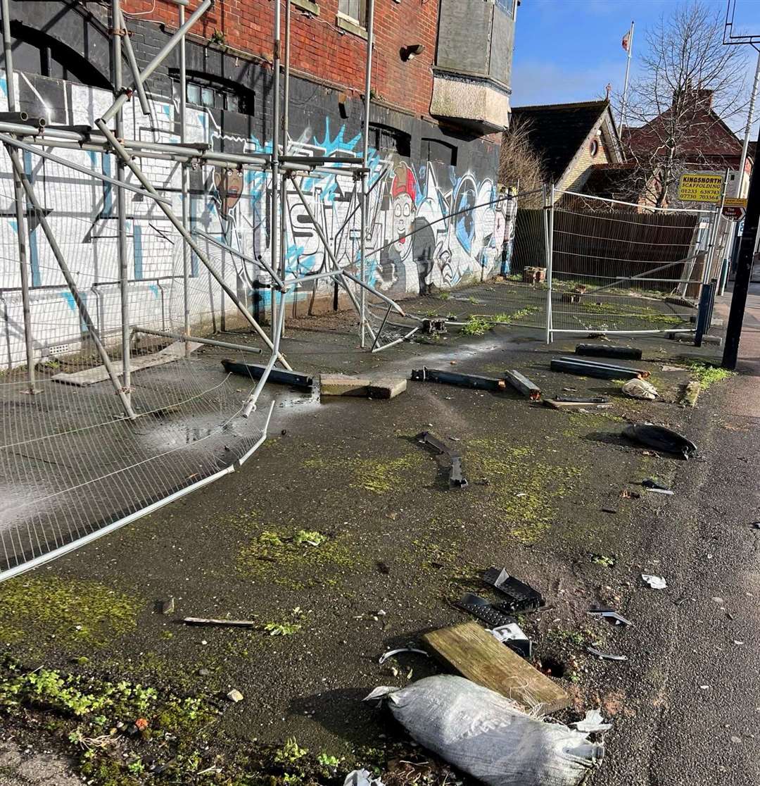 The aftermath of a crash which saw a DPD van hit scaffolding surrounding the former White Lion pub in Cheriton Road yesterday afternoon. Picture: Amber Vellacott