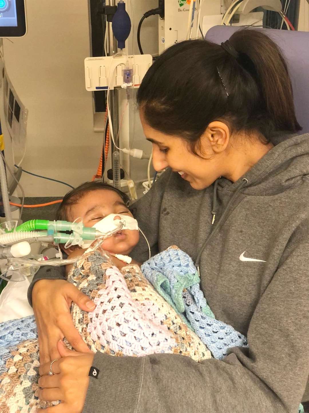 Harvey and his mother Karen in hospital (Karen Bahia/PA)