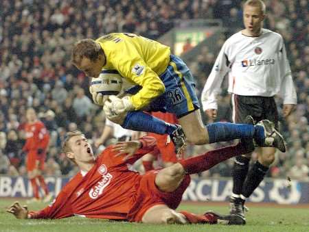 Addicks keeper Thomas Myhre makes another great save, this time from the feet of Peter Crouch. Picture: MATTHEW WALKER