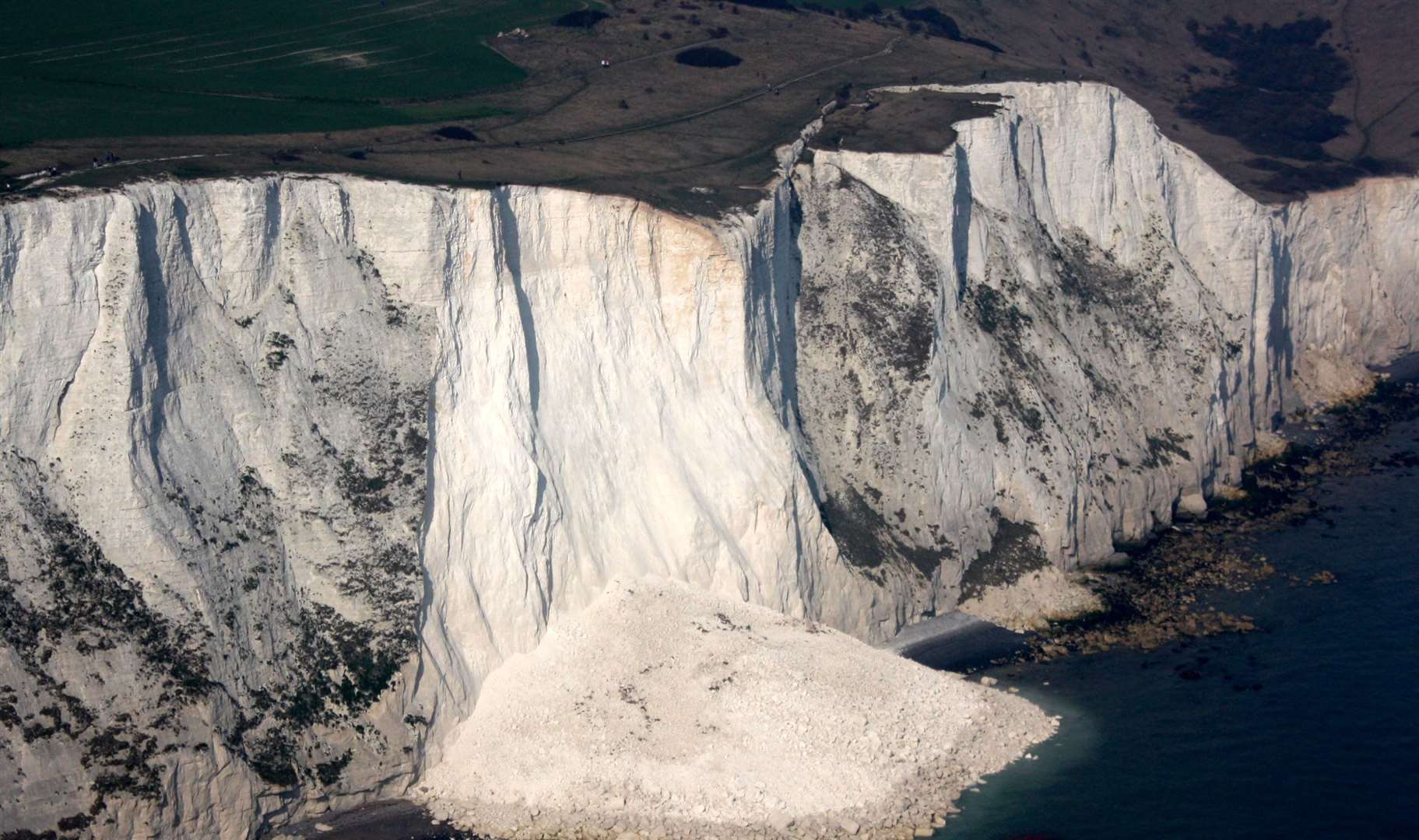 A chunk of the White Cliffs of Dover collapsing into the sea in 2012. Picture: Geoff Hall