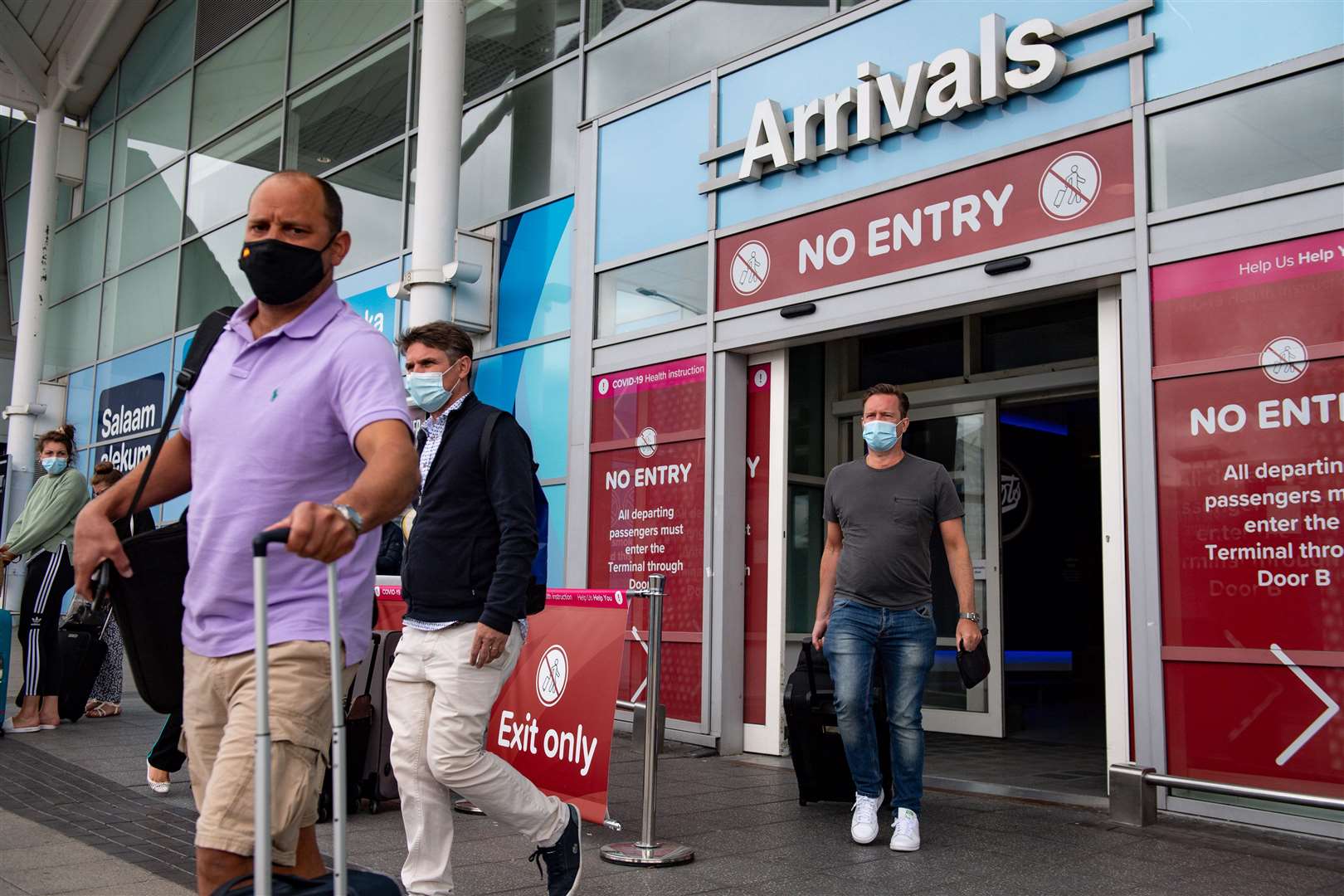 Passengers flying from Malaga arrive at Birmingham Airport (Jacob King/PA)