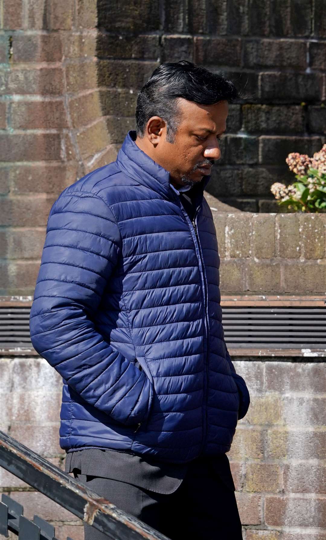 Former GP Mohan Babu was convicted of four offences following a trial (Gareth Fuller/PA Wire)