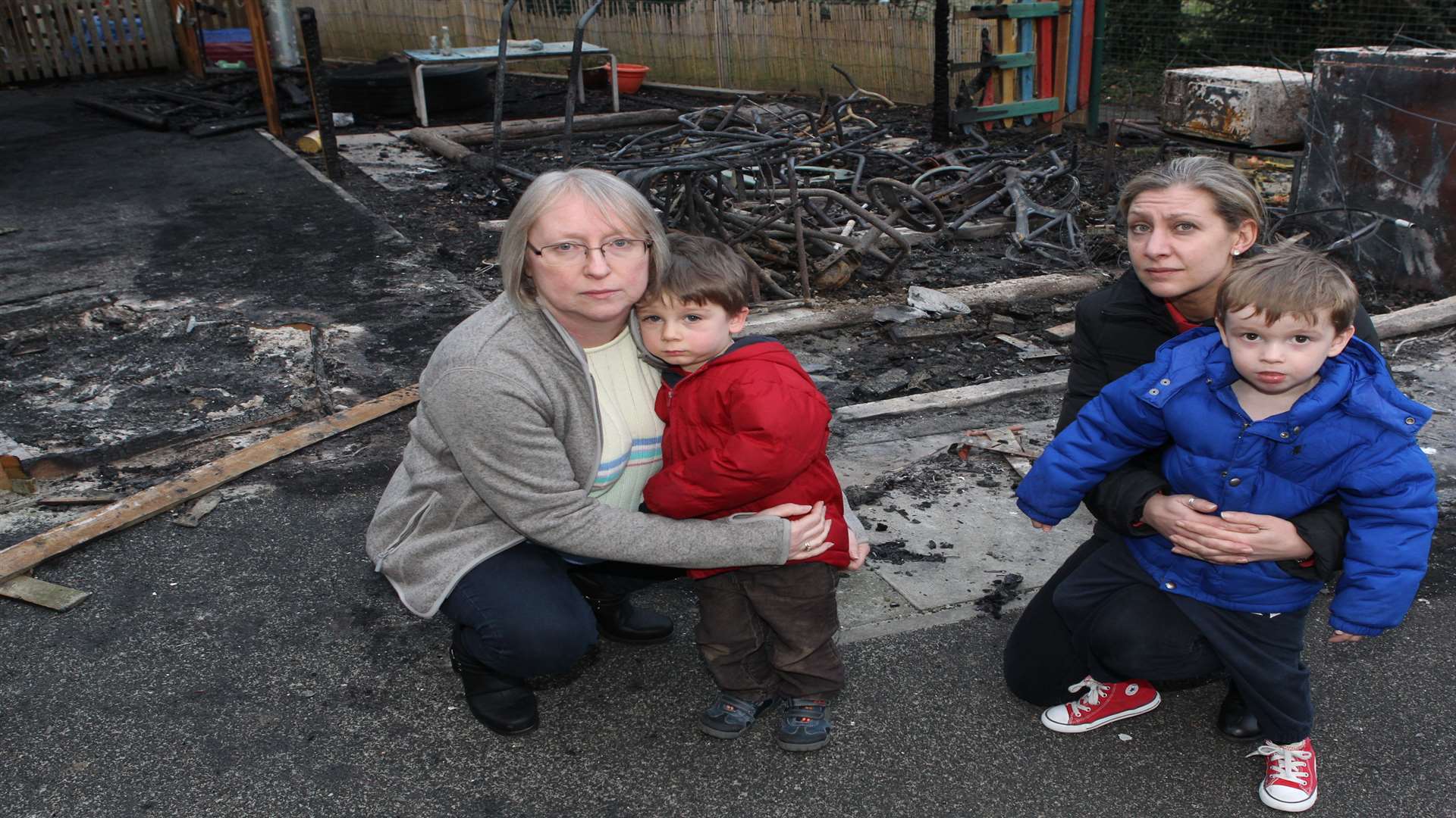 Carol Fairman, manager and Nathan with Claire Donnelly, deputy manager and Vinnie of Acorns Early Year Centre in Dartford