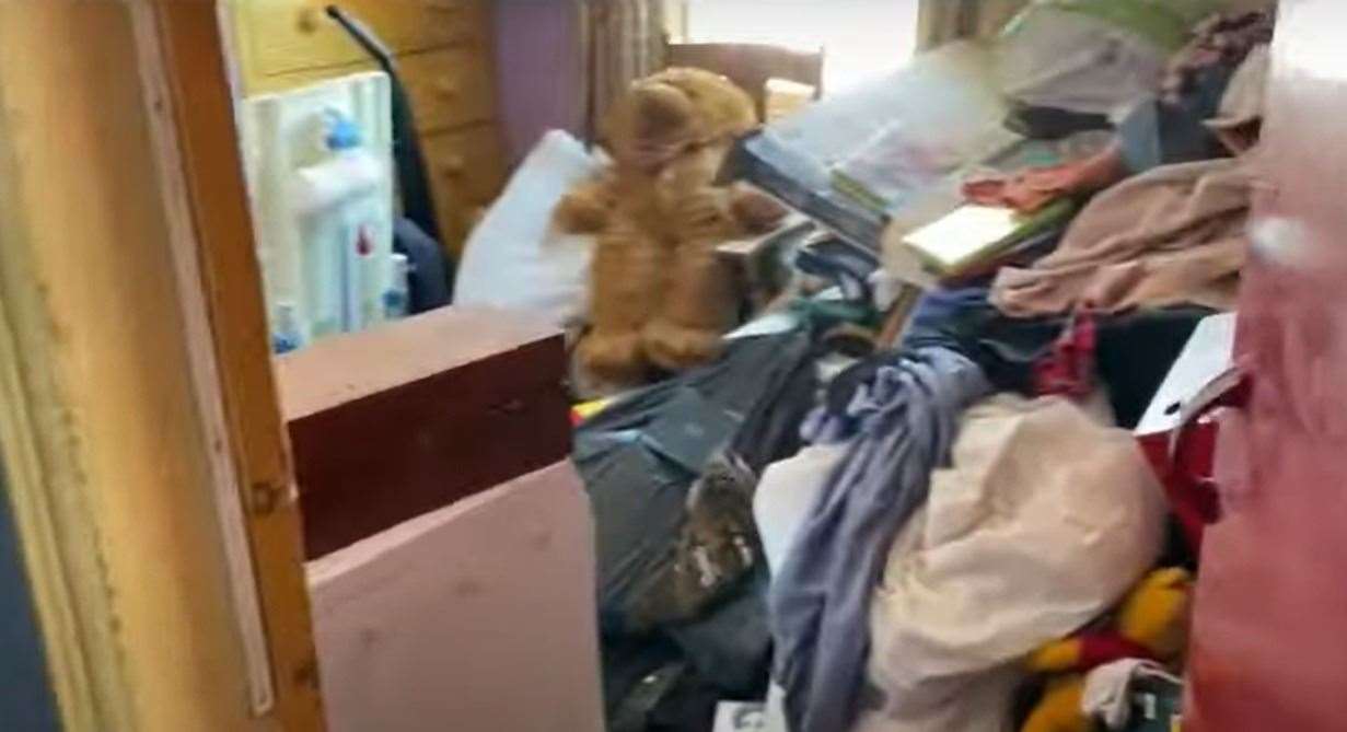 A first floor room crammed with belongings. Picture: Clive Emson / YouTube
