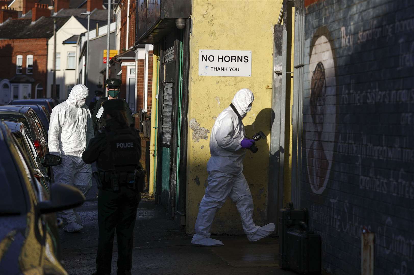 Emergency services attend the scene in Hawthorn Street, Belfast, after security alerts in Londonderry and Belfast have closed a school and a medical centre (Liam McBurney/PA)