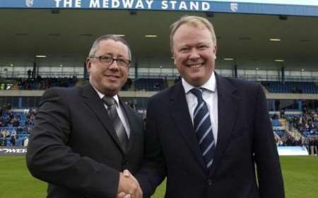 SEALED: Paul Scally and Simon Irwin shake hands in front of what will be known as the KM Medway Stand. Picture: GRANT FALVEY