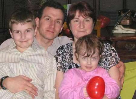 Molly, front right, with Chris and Rita Treves and her brother Sam