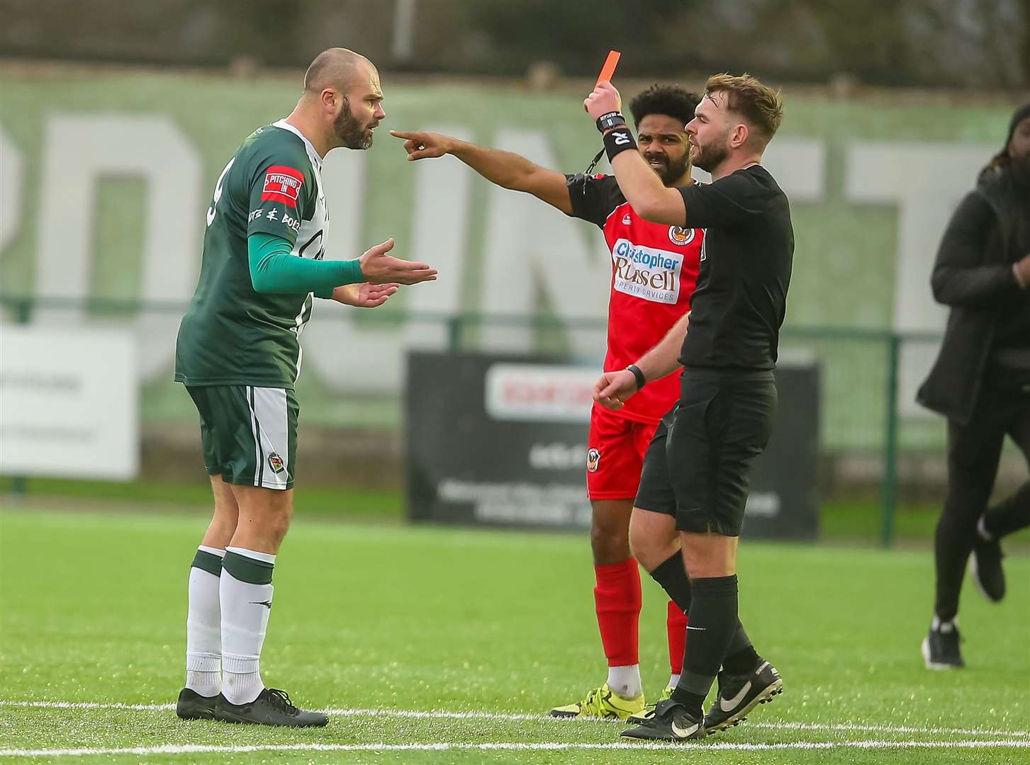 Ashford striker Gary Lockyer protests his innocence after being sent off. Picture: Ian Scammell