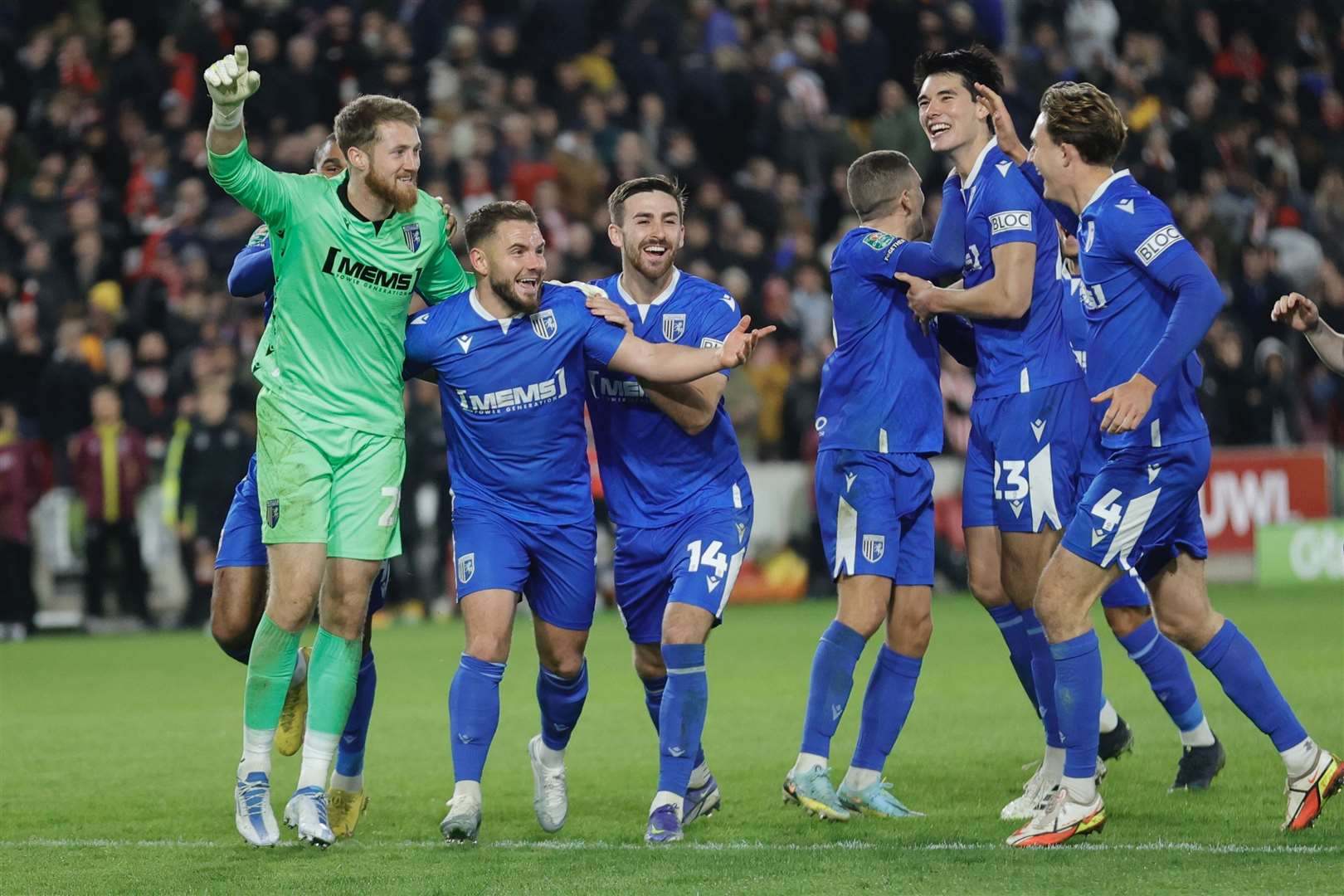 Gillingham celebrate their shootout success at Brentford Picture: KPI