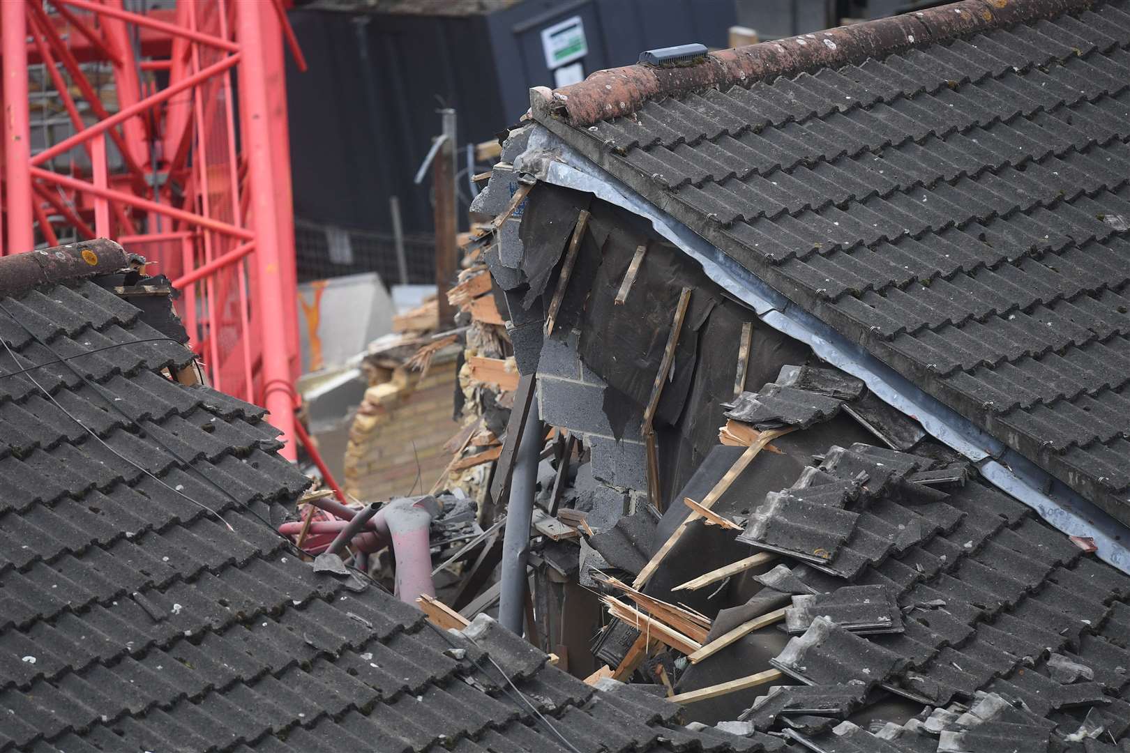 View of the damage caused in Bow where a 20-metre crane collapsed (Victoria Jones/PA)