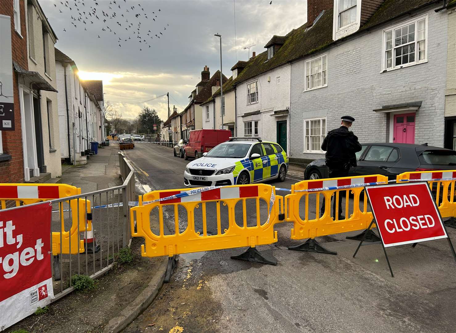 Police cordoned off the main route through the village