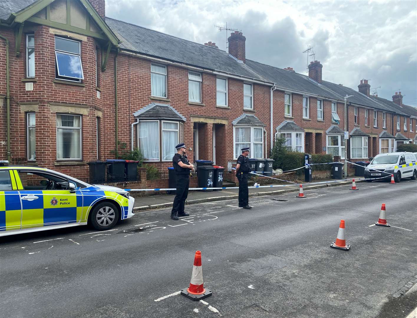 Three properties in St Martin's Road, Canterbury, were cordoned off on Friday