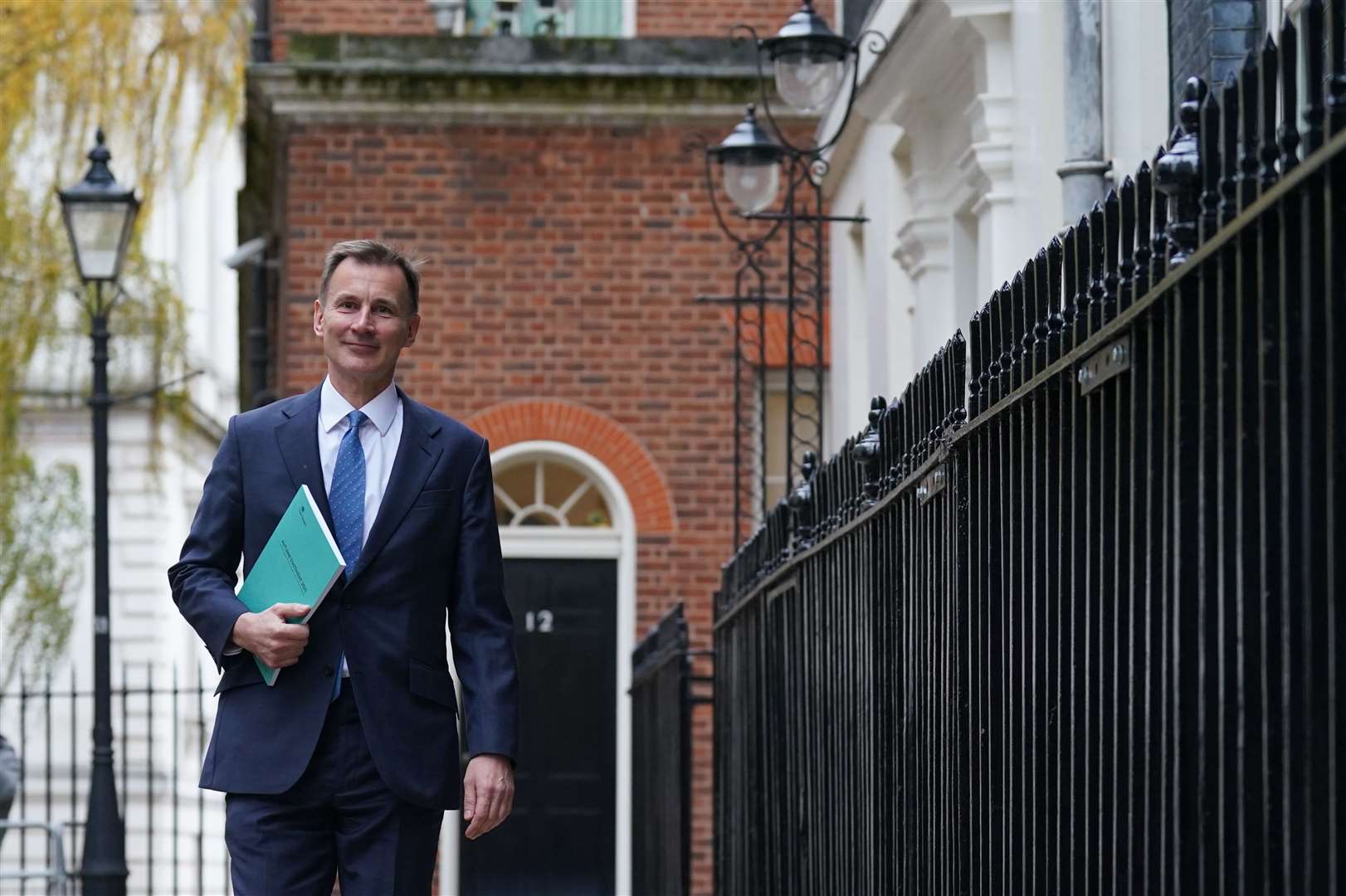 Jeremy Hunt focused on reducing debt and cutting taxes in his autumn statement (Stefan Rousseau/PA)