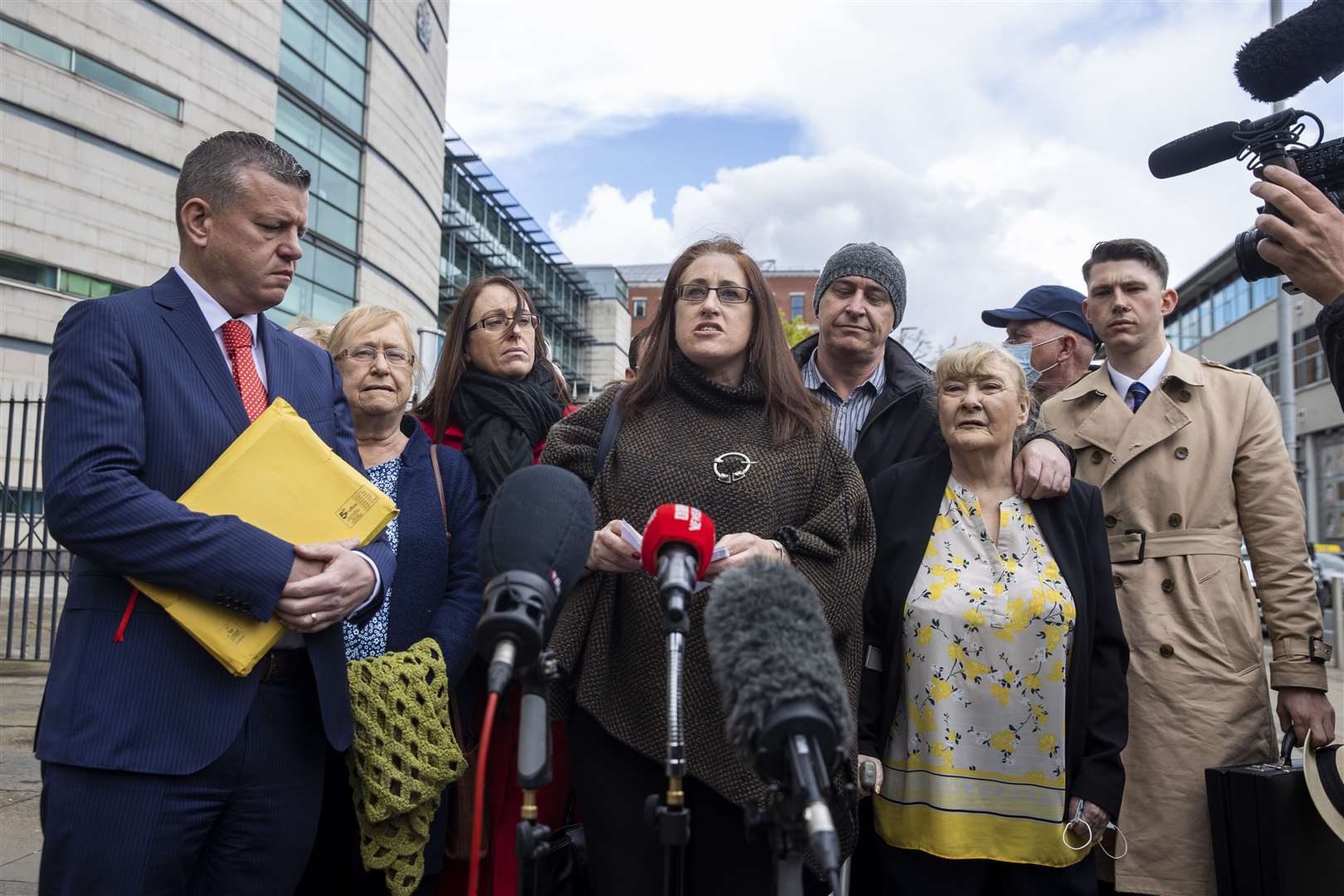 Aine McCann (centre) outside Laganside Court in Belfast (Liam McBurney/PA)