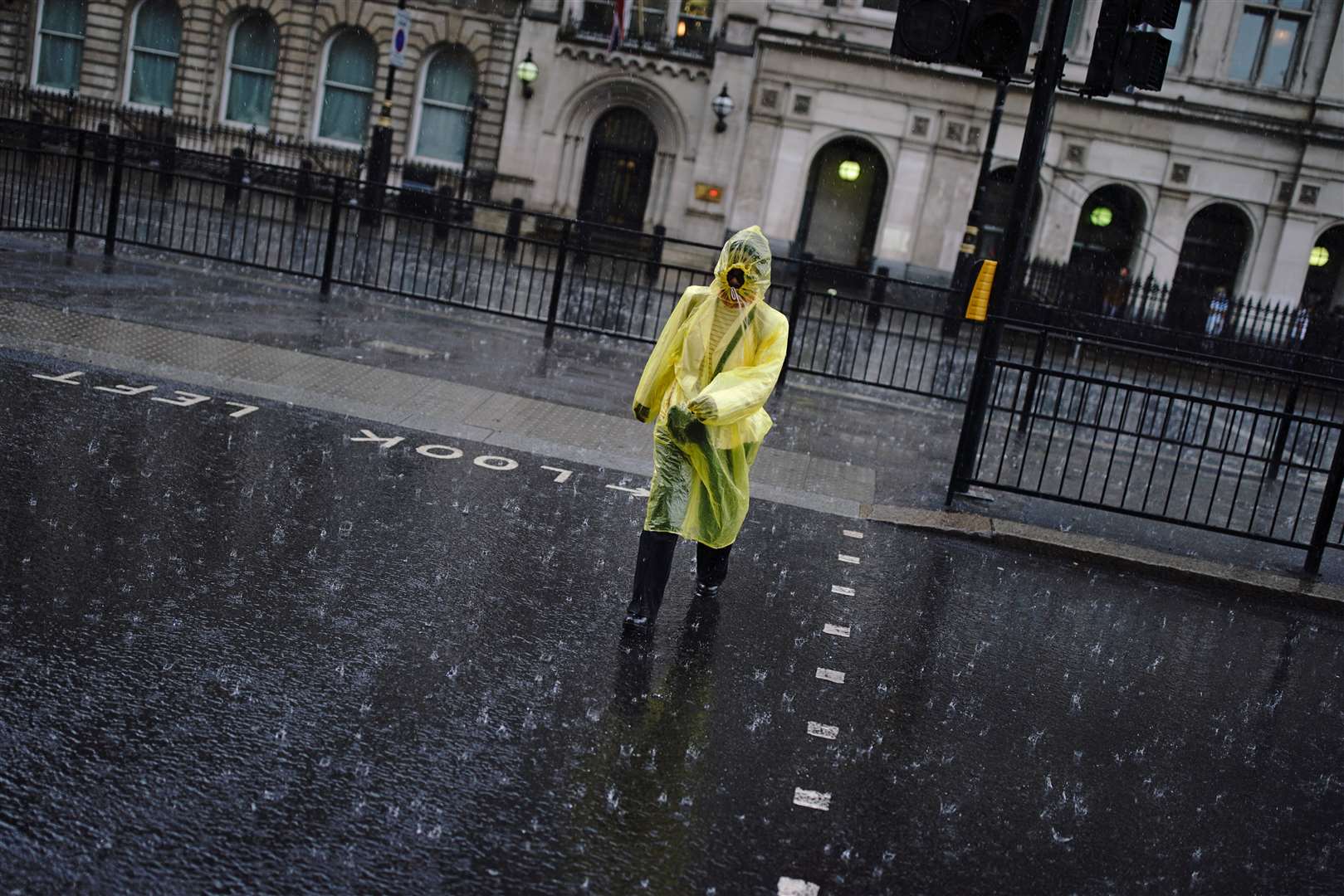 Heavy rain in London (Aaron Chown/PA)