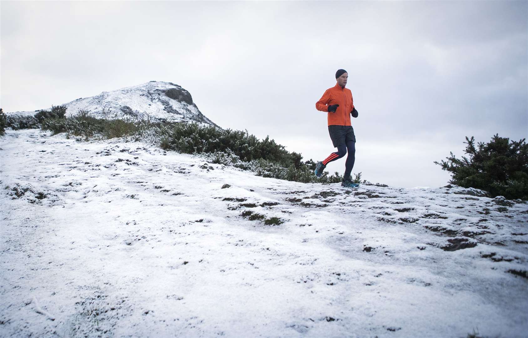 The Met Office said it will stay cold into the weekend with rain, showers and hill snow continuing across many areas (Jane Barlow/PA)