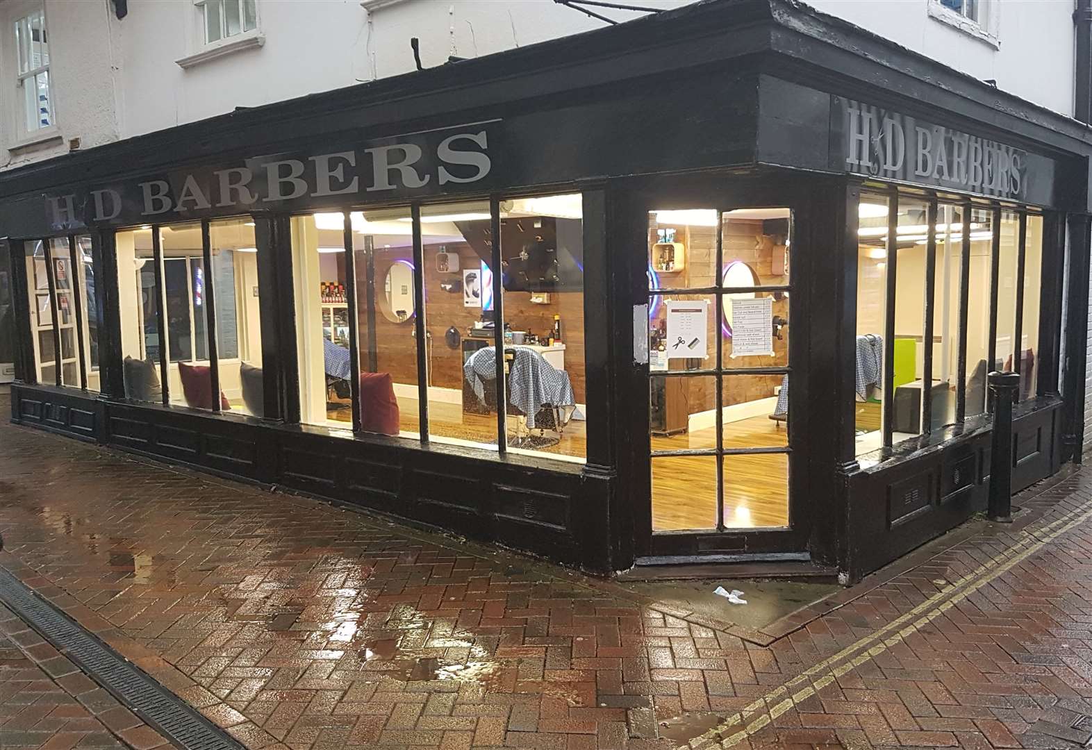 The attack took place outside HD Barbers in Ashford High Street