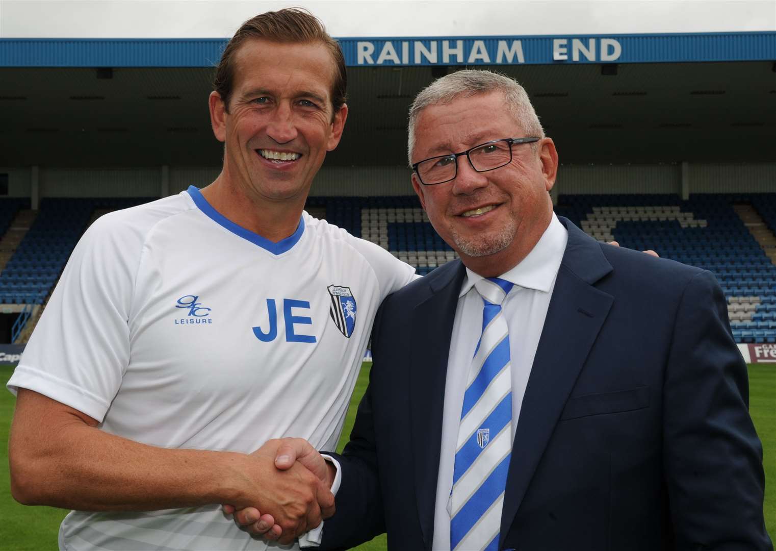 Gillingham chairman Paul Scally pictured with Justin Edinburgh in 2016. Picture: Steve Crispe