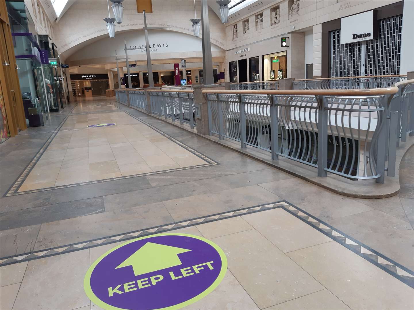 Signs at Bluewater shopping centre tell people to keep to one side