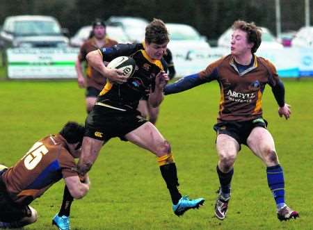 Canterbury's Gert De Kock is tackled by Worthing full back Matt McLeam