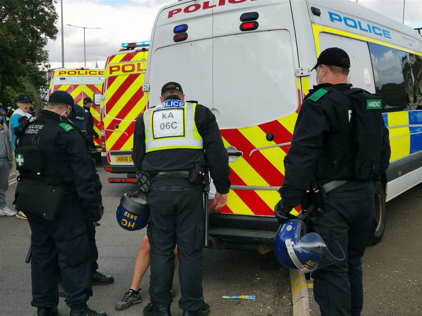 Police speak with a protester. Picture: Oliver Kemp