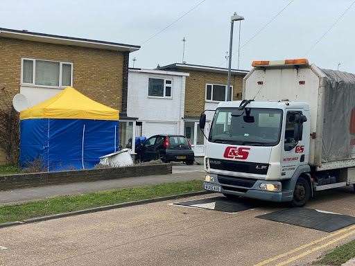 Police put up a tent outside the house in Freemen's Way, Deal
