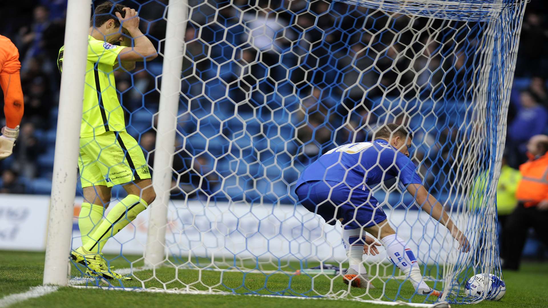 Cody McDonald picks the ball out of the net after captain Doug Loft scores Picture: Barry Goodwin