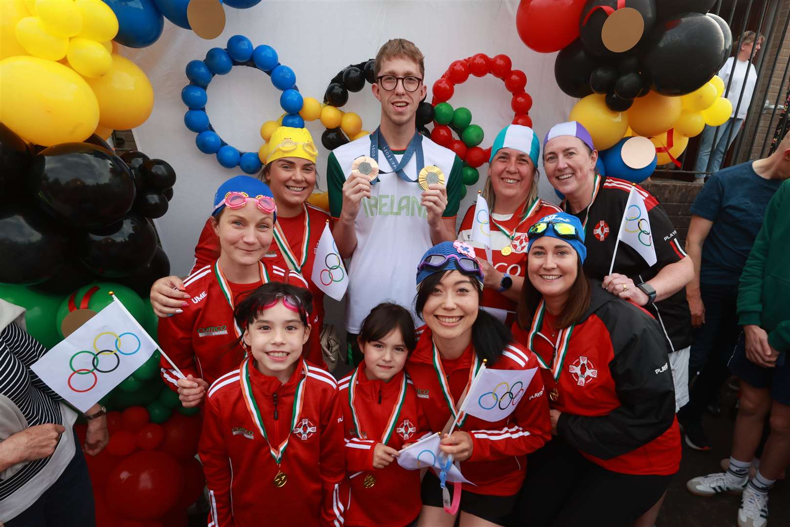 Gold and bronze medal winning swimmer Daniel Wiffen meets members of St Michael’s Gaelic Athletic Club (Liam McBurney/PA)