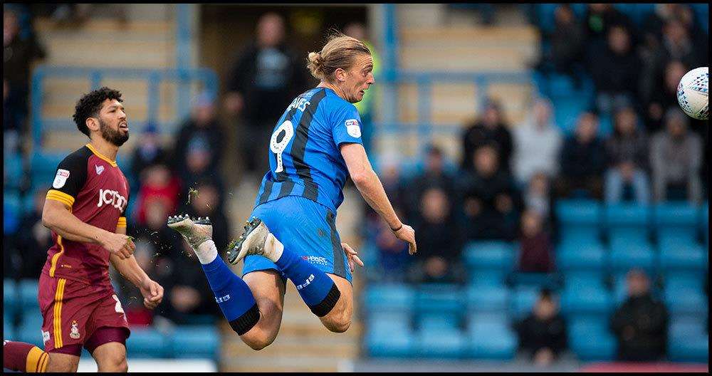 Tom Eaves heads home Gills' fourth goal Picture: Ady Kerry (5052324)