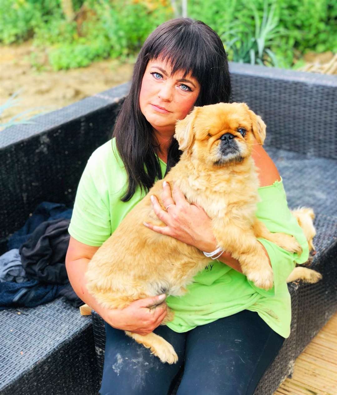 Amey James, founder of The Happy Pants Ranch at Bobbing with another rescued dog