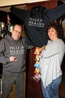 Steward John Scott and chief barmaid Vickie Hawksworth with the hoody