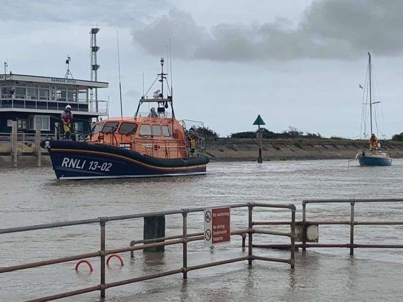 Lifeboat towing the sailing boat to safety in Rye Harbour. Picture: Lisa Adams RNLI