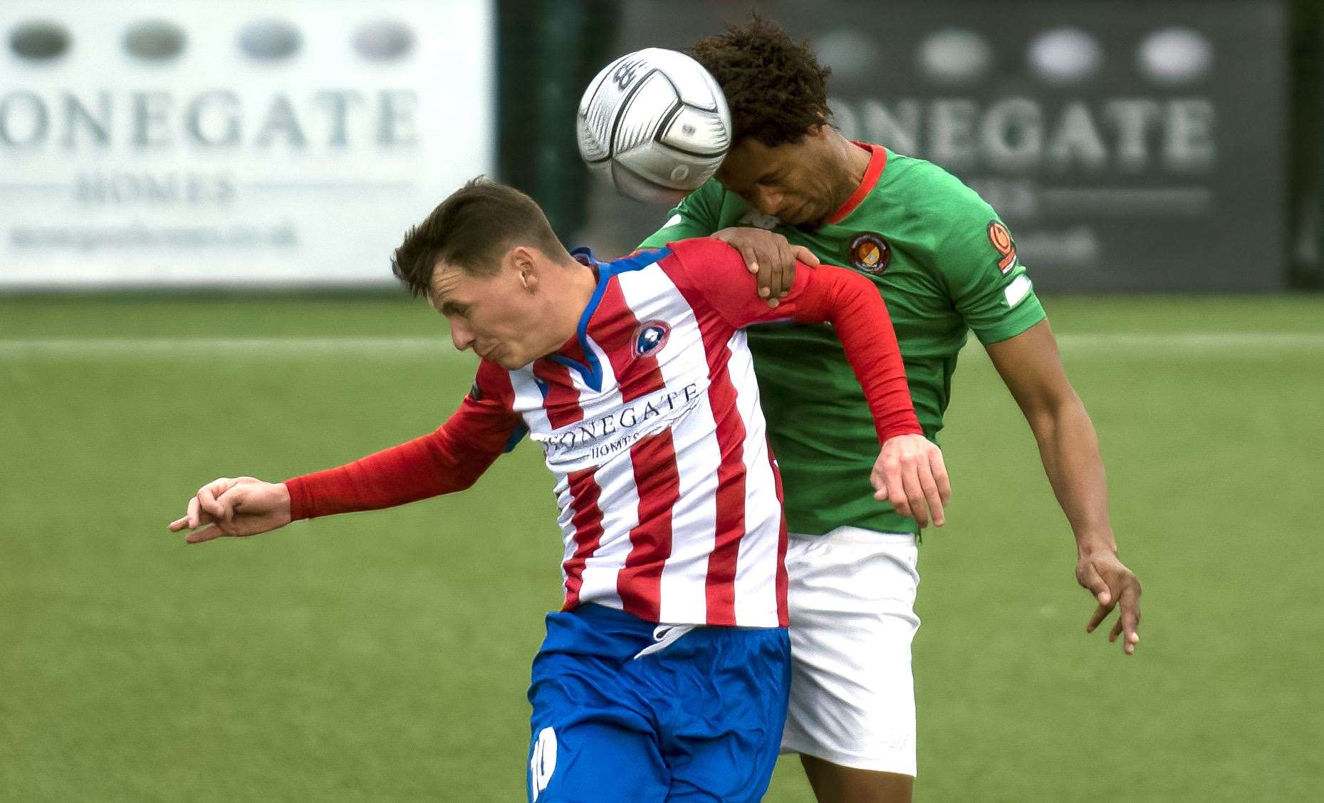 Fleet's Sido Jombati wins a header against Dorking Wanderers on Saturday - but injury cut short his afternoon. Picture: Ed Miller/EUFC (54445913)