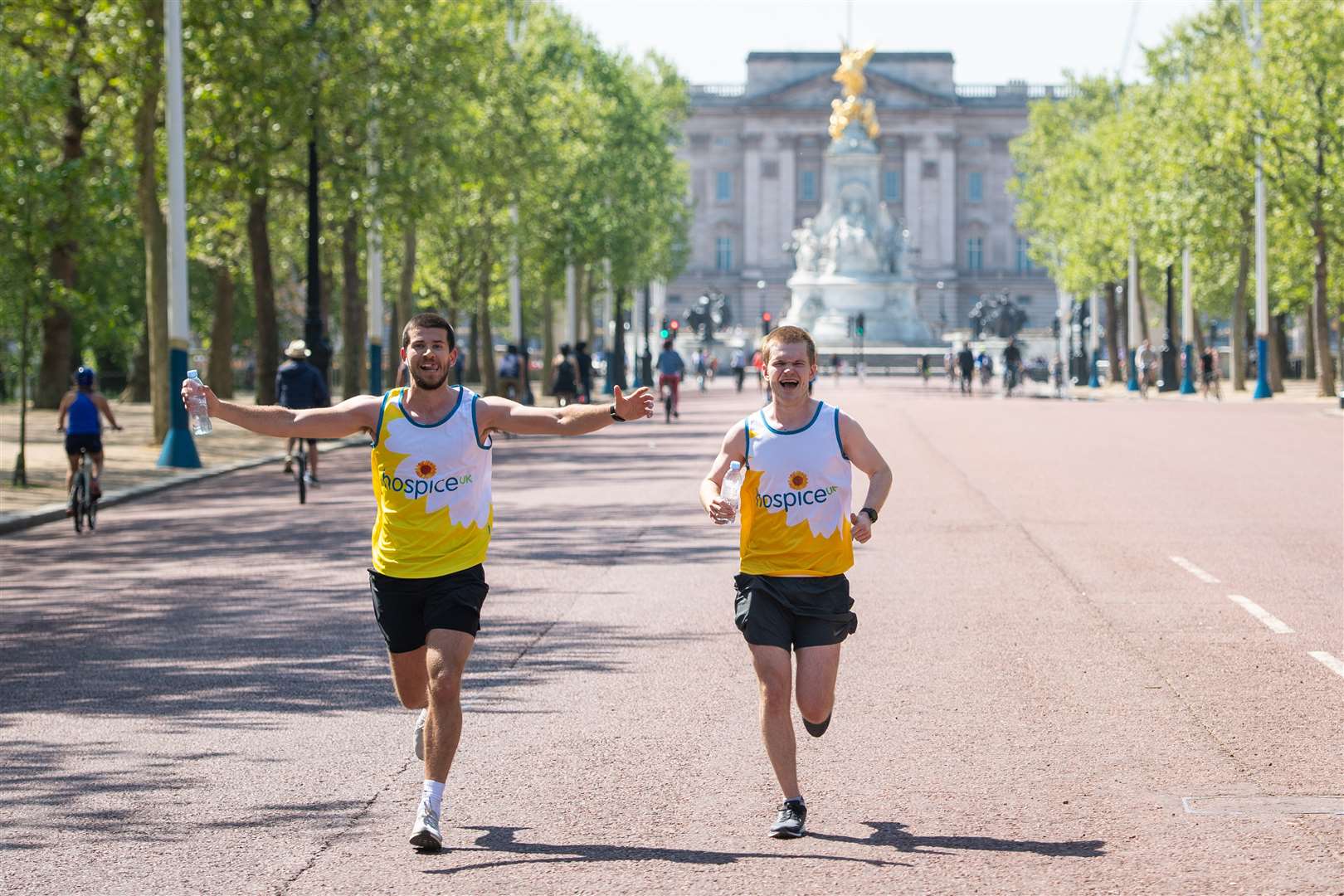 Runners on the Mall in central London, the usual finish of the London Marathon course (Dominic Lipinski) (PA)